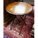 An early 20th century circular beech folding occasional table on faux bamboo underframe, diameter