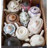 A quantity of of various teapots including Doulton, Sadler etc.