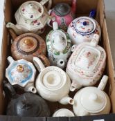 A quantity of of various teapots including Doulton, Sadler etc.