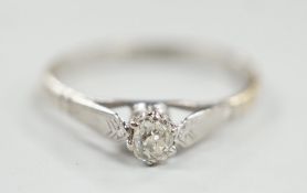 An 18ct, plat and solitaire diamond set ring, size P/Q, gross weight 2.1 grams.