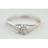 An 18ct, plat and solitaire diamond set ring, size P/Q, gross weight 2.1 grams.