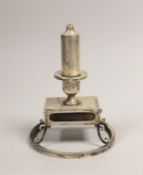 A late Victorian silver combination cigar lighter and matchbox holder, on circular foot, Gibson &