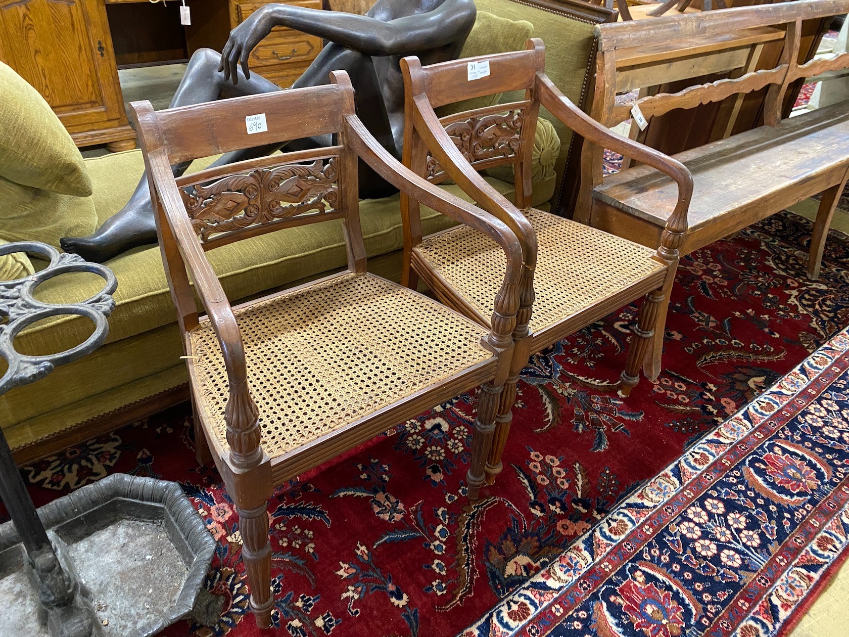 A pair of Indonesian caned hardwood elbow chairs, width 55cm, depth 44cm, height 86cm - Image 2 of 2