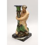 A pearlware ‘Triton’ figural candlestick, attributed to Wood & Caldwell, c.1800, 24cm, after a