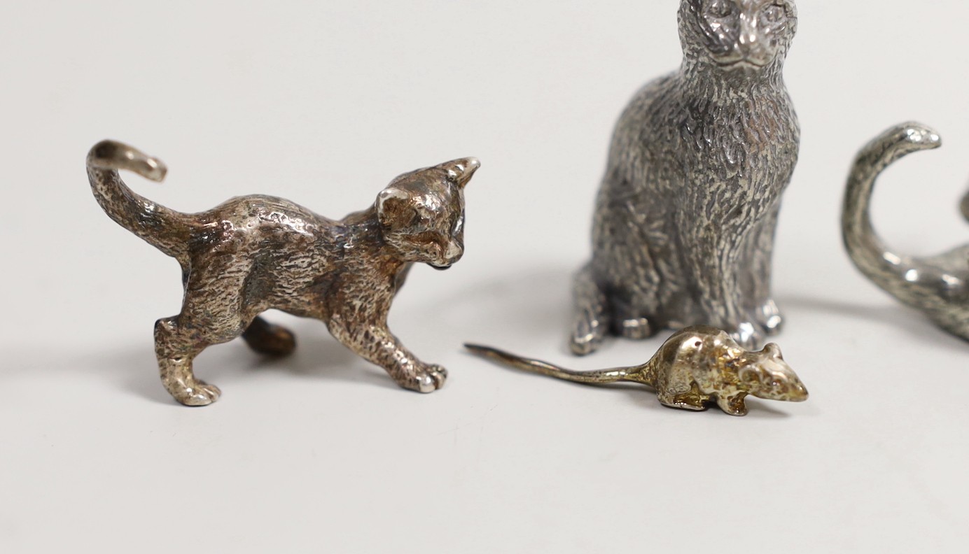 A modern silver miniature free standing model of a cat, with raised paw, London, 1995, length - Image 2 of 5