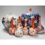 6 Japanese Kutani porcelain bottle vases together with two Chinese famille rose jars and covers,