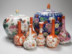 6 Japanese Kutani porcelain bottle vases together with two Chinese famille rose jars and covers,