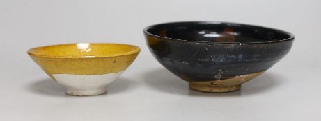 A Chinese amber-glazed pottery conical bowl with moulded floral decoration, Liao dynasty: and a