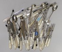 A selection of mounted mother-of-pearl knives and forks, together with finely decorated enamelled