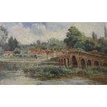 English School, early 20th century, oil on canvas, village scene with bridge, indistinctly signed,