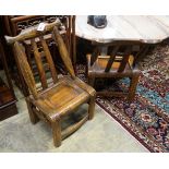 Four Chinese elm yoke back childs' chairs