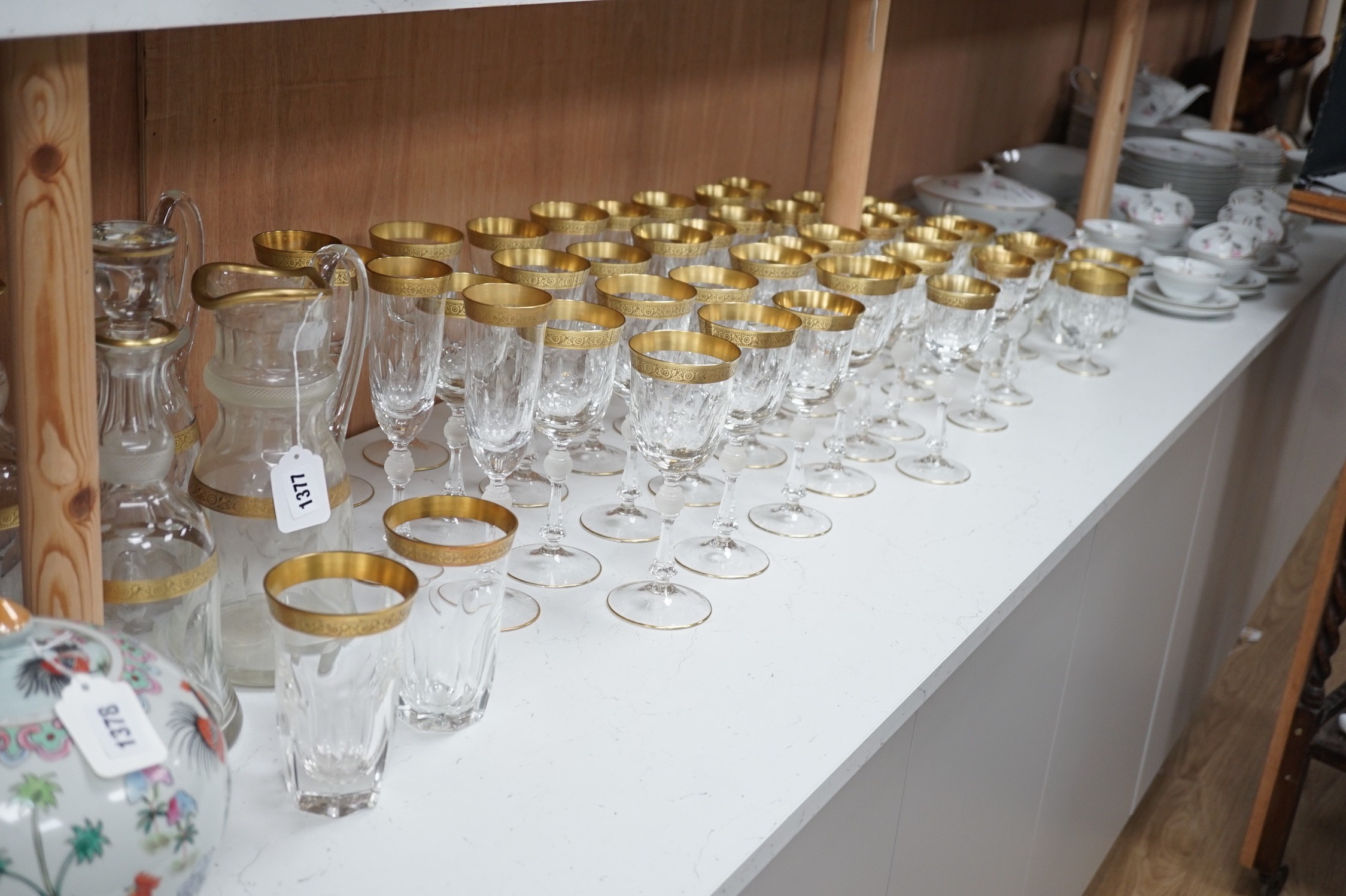 A Harrods retailed parcel gilt and cut and moulded suite of drinking glasses, two decanters and - Image 2 of 6