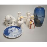 A group of Royal Copenhagen porcelain figural candle holders, a vase, the figure of a polar bear cub