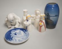 A group of Royal Copenhagen porcelain figural candle holders, a vase, the figure of a polar bear cub