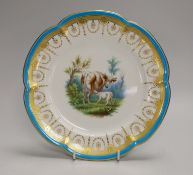 A Minton plate with turquoise, acid etched and raised gilt border painted with a cow and a sheep