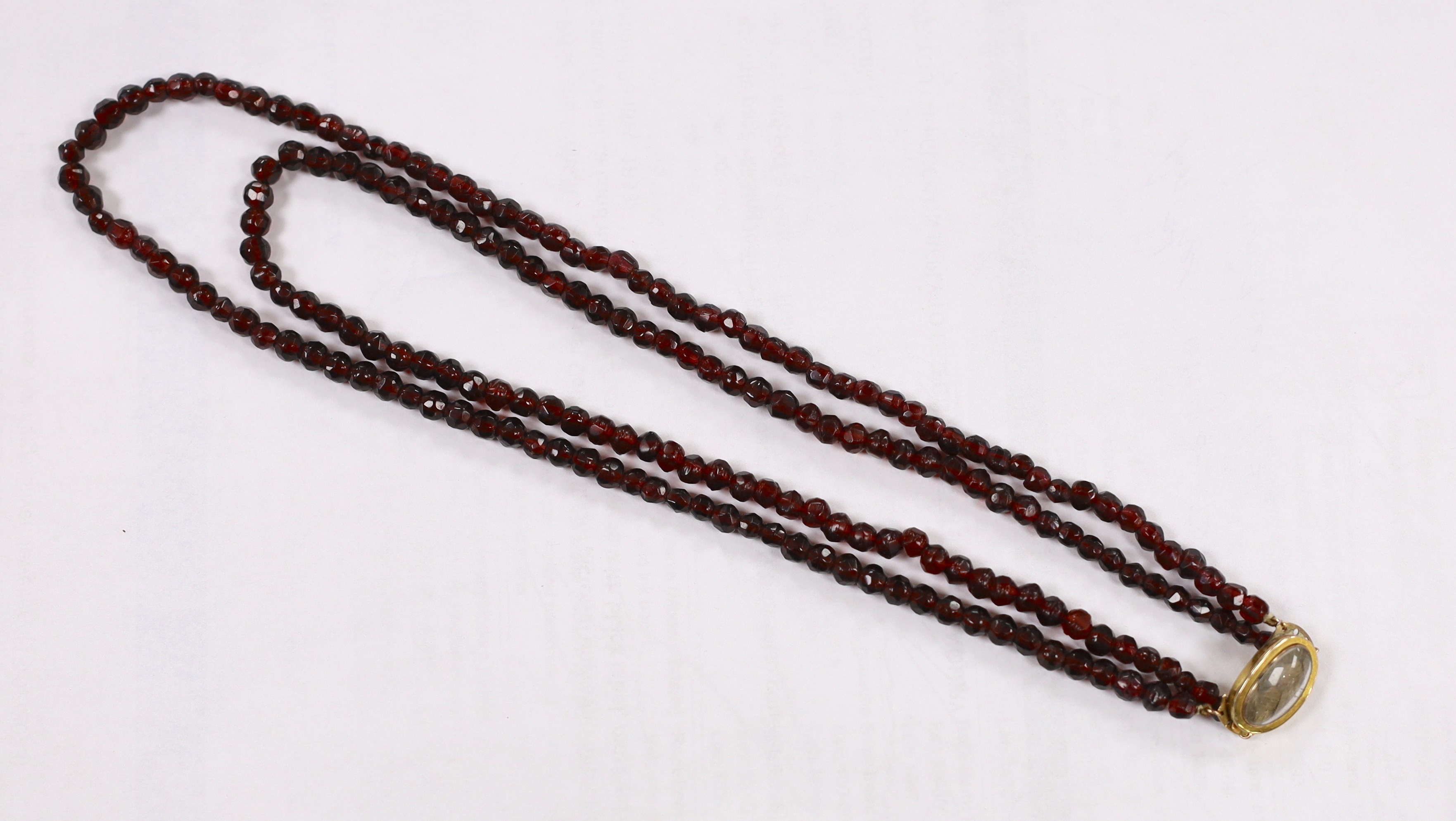 A George III twin strand facetted red paste? necklace, with yellow metal and plaited hair clasp, - Image 2 of 4