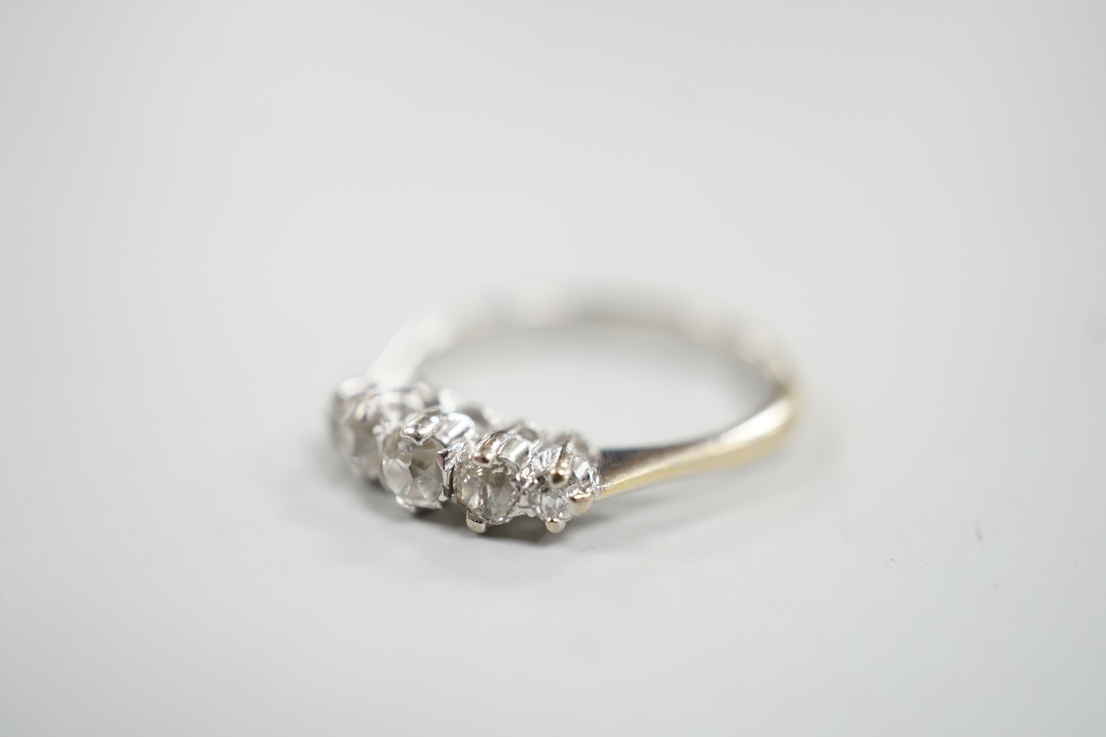 A 1970's 18ct white gold and graduated five stone diamond ring, size L/M, gross weight 3 grams. - Image 2 of 4