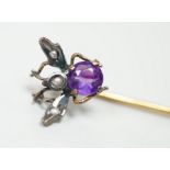 An early 20th century yellow and white metal amethyst and seed pearl set bug stick pin, 4mm, gross