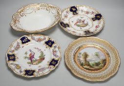 A Copeland plate decorated in Chelsea style with exotic birds on a mazarine blue ground, a similar
