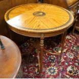 An Edwardian Sheraton revival circular painted satinwood centre table, diameter 76cm, height 77cm