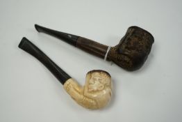 A Meerschaum pipe and an African ebony pipe