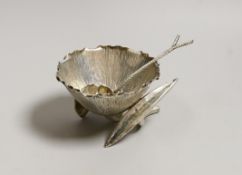 An Edwardian silver lotus shaped sugar bowl and matching sugar sifting spoon, by Hukin & Heath,