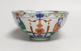 A Chinese wucai ‘boys’ bowl, Kangxi mark late 19th/early 20th century, dragon to the interior, 16.