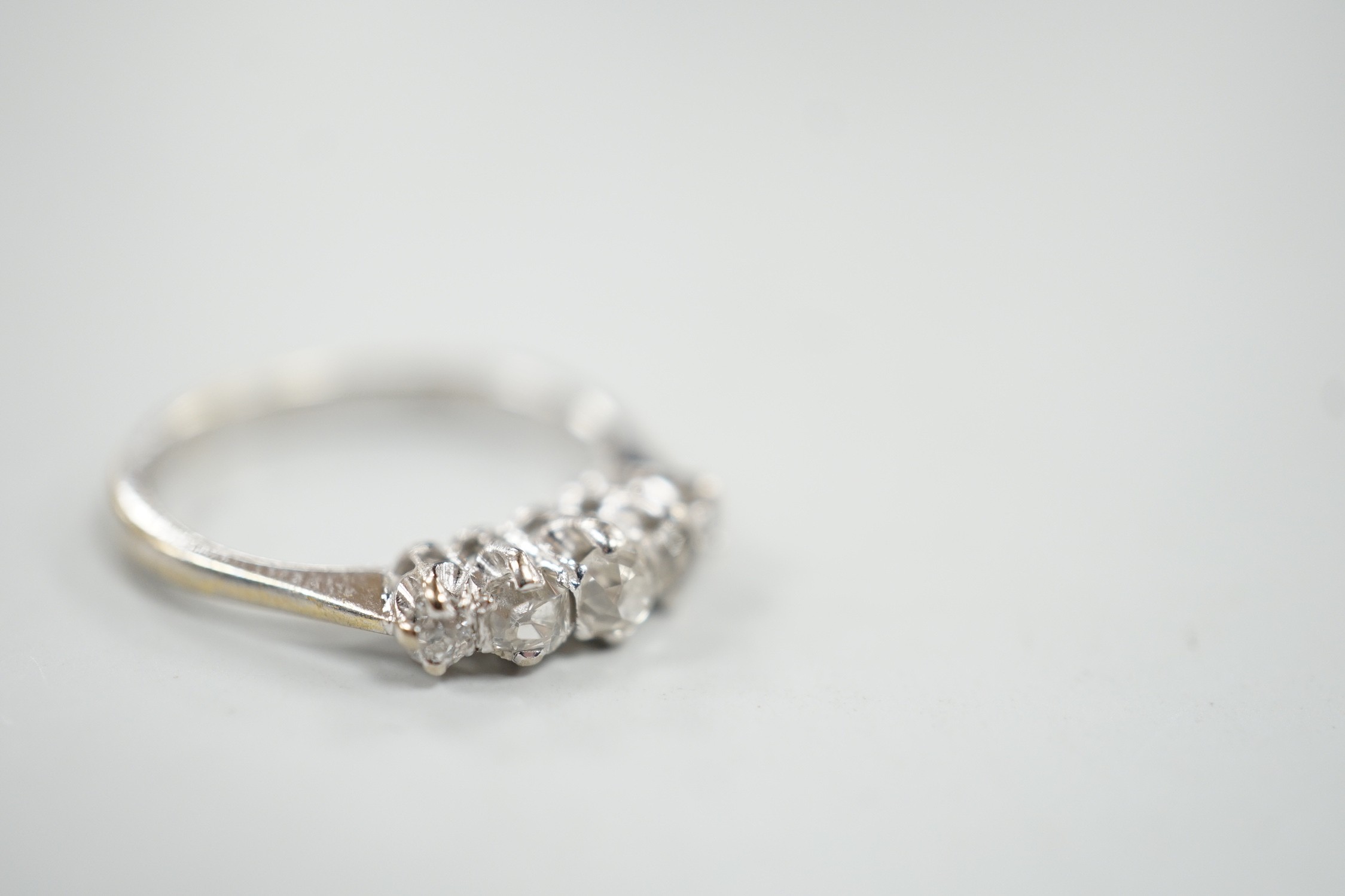 A 1970's 18ct white gold and graduated five stone diamond ring, size L/M, gross weight 3 grams. - Image 3 of 4