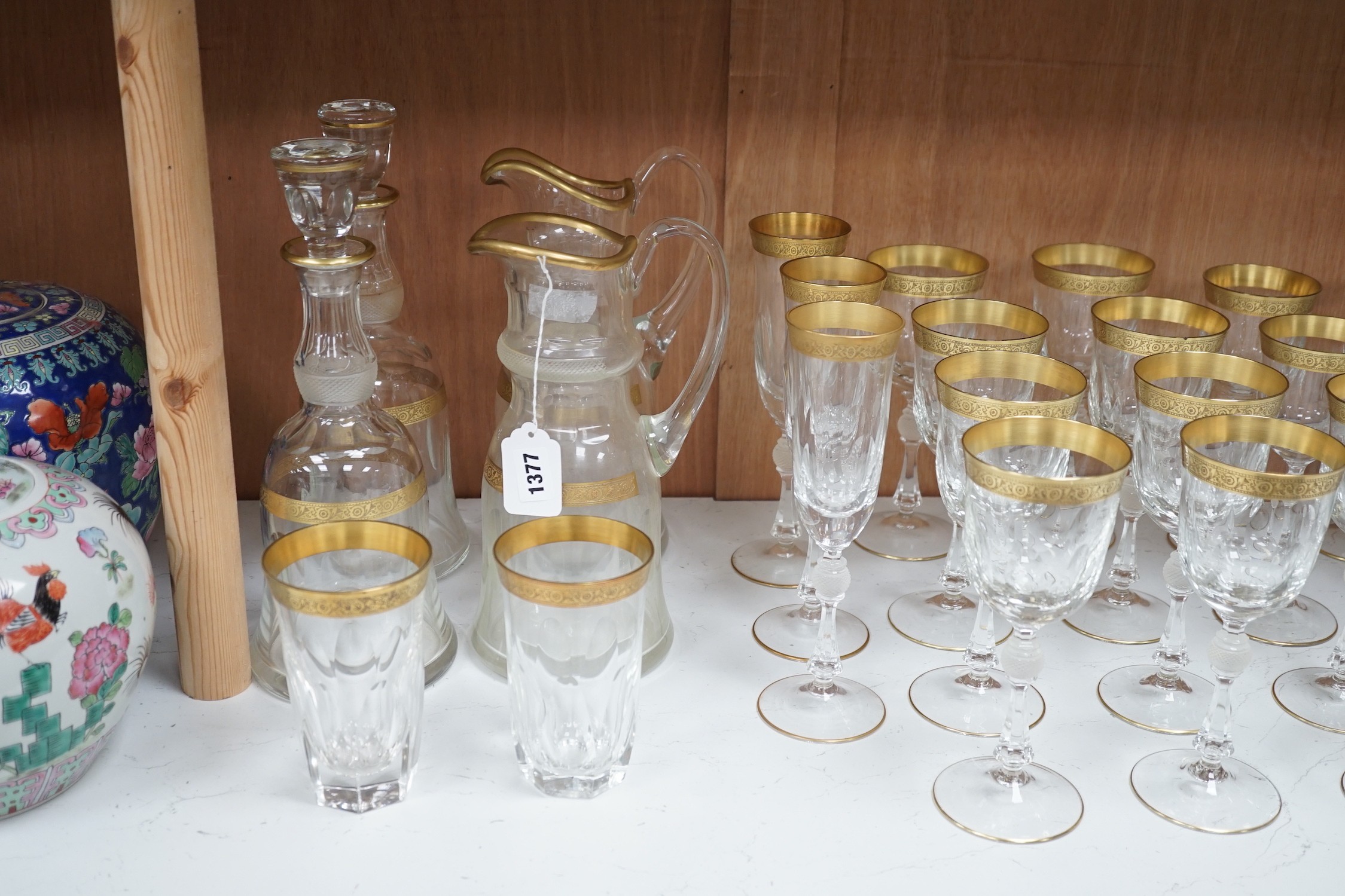 A Harrods retailed parcel gilt and cut and moulded suite of drinking glasses, two decanters and - Image 3 of 6