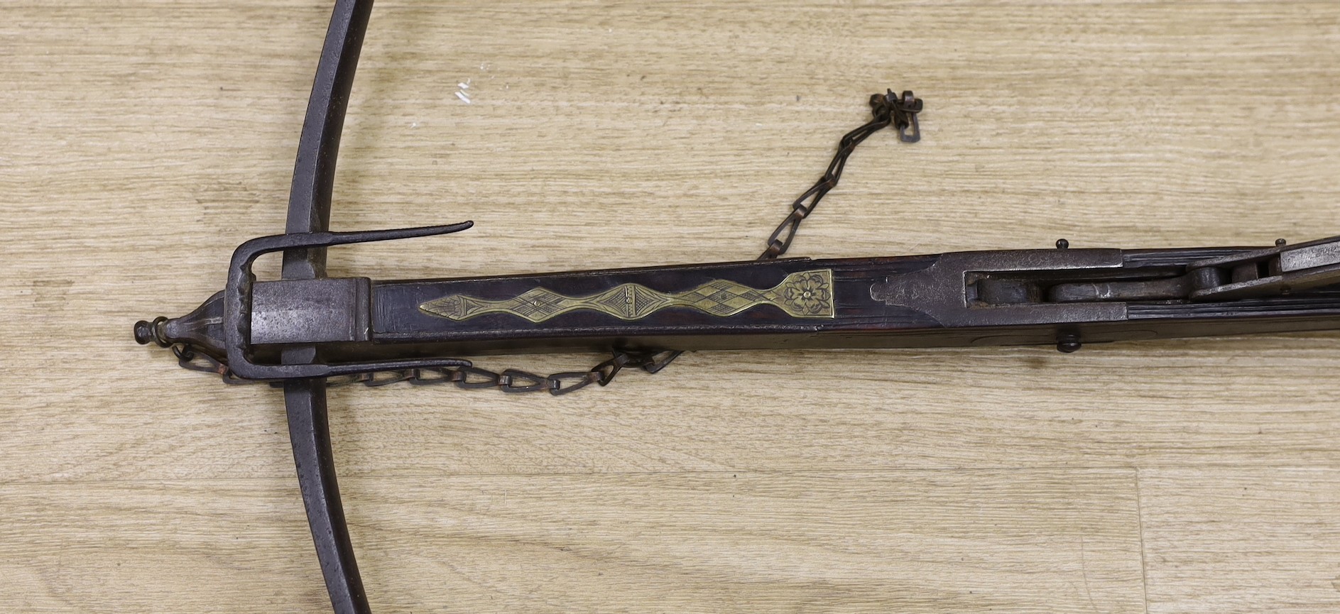 An 18th century English mahogany, brass and iron mounted bullet crossbow, 69cm, pommel end - Image 2 of 2