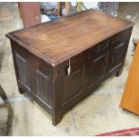 An 18th century style panelled oak coffer, length 107cm, depth 55cm, height 63cm