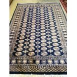 A Bokhara blue ground carpet, 270 x 186cm