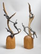 A pair of bronze and antler dancer groups in the style of Edgar Degas, 49cms high