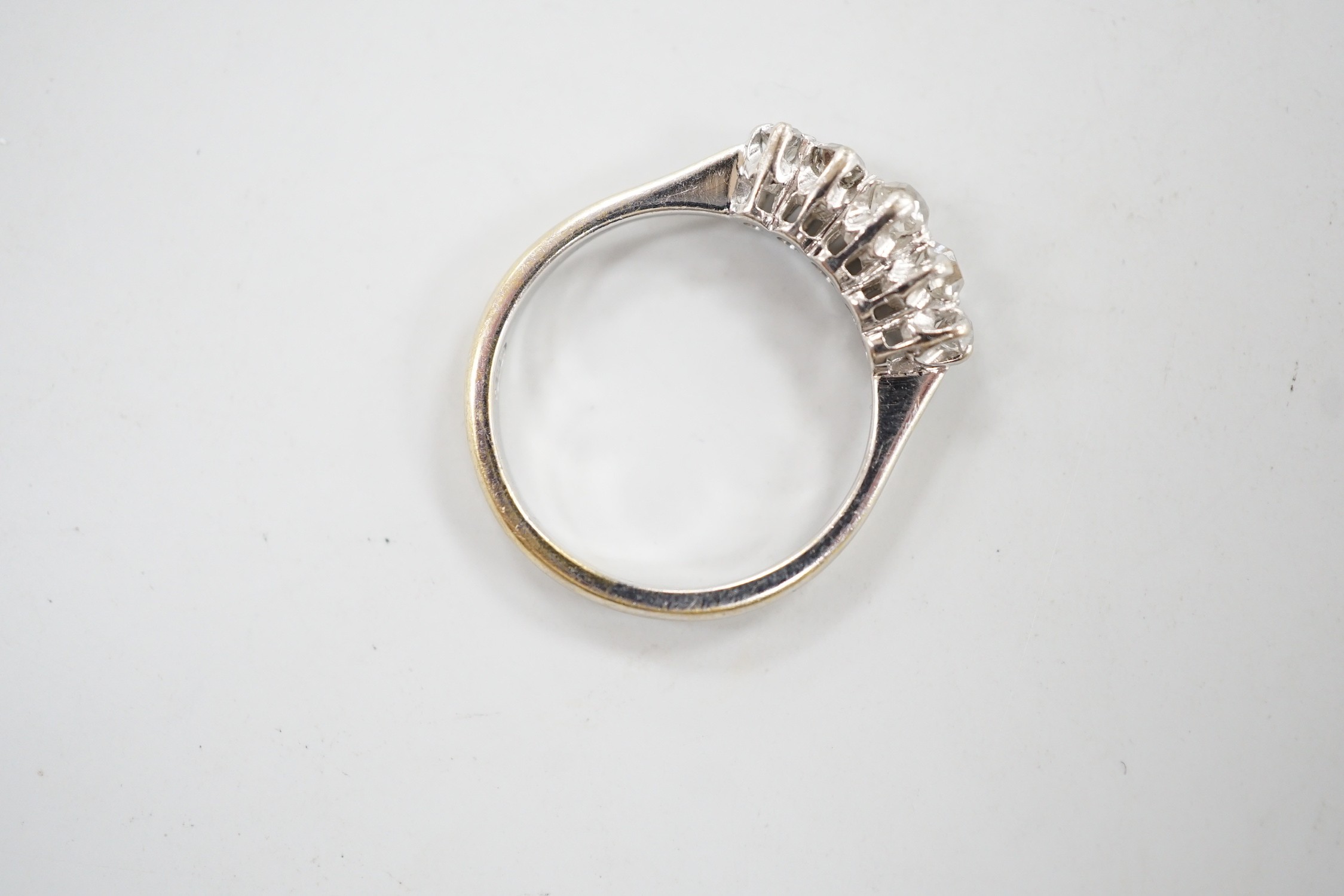 A 1970's 18ct white gold and graduated five stone diamond ring, size L/M, gross weight 3 grams. - Image 4 of 4