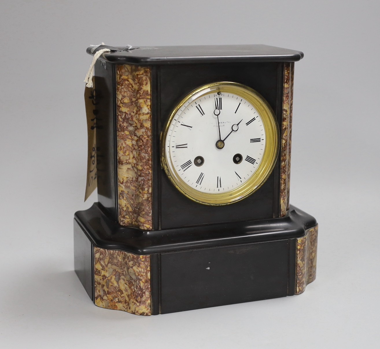 A black slate and marble mantel clock, 22cm