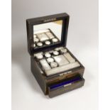 A late Victorian Mappin & Webb coromandel wood toilet box, containing ten silver mounted toilet