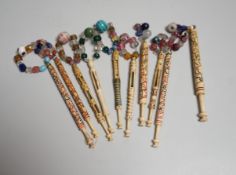 Five 19th century unusual reticulated bone lace bobbins with diagonal messages and five other