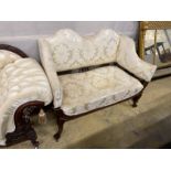 A late Victorian upholstered mahogany framed settee in cream damask, length 124cm, depth 68cm,