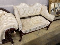 A late Victorian upholstered mahogany framed settee in cream damask, length 124cm, depth 68cm,