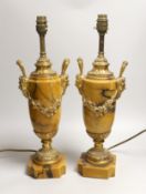 A pair of neo classical revival gilt metal and Siena marble lamps, 43cms high including light