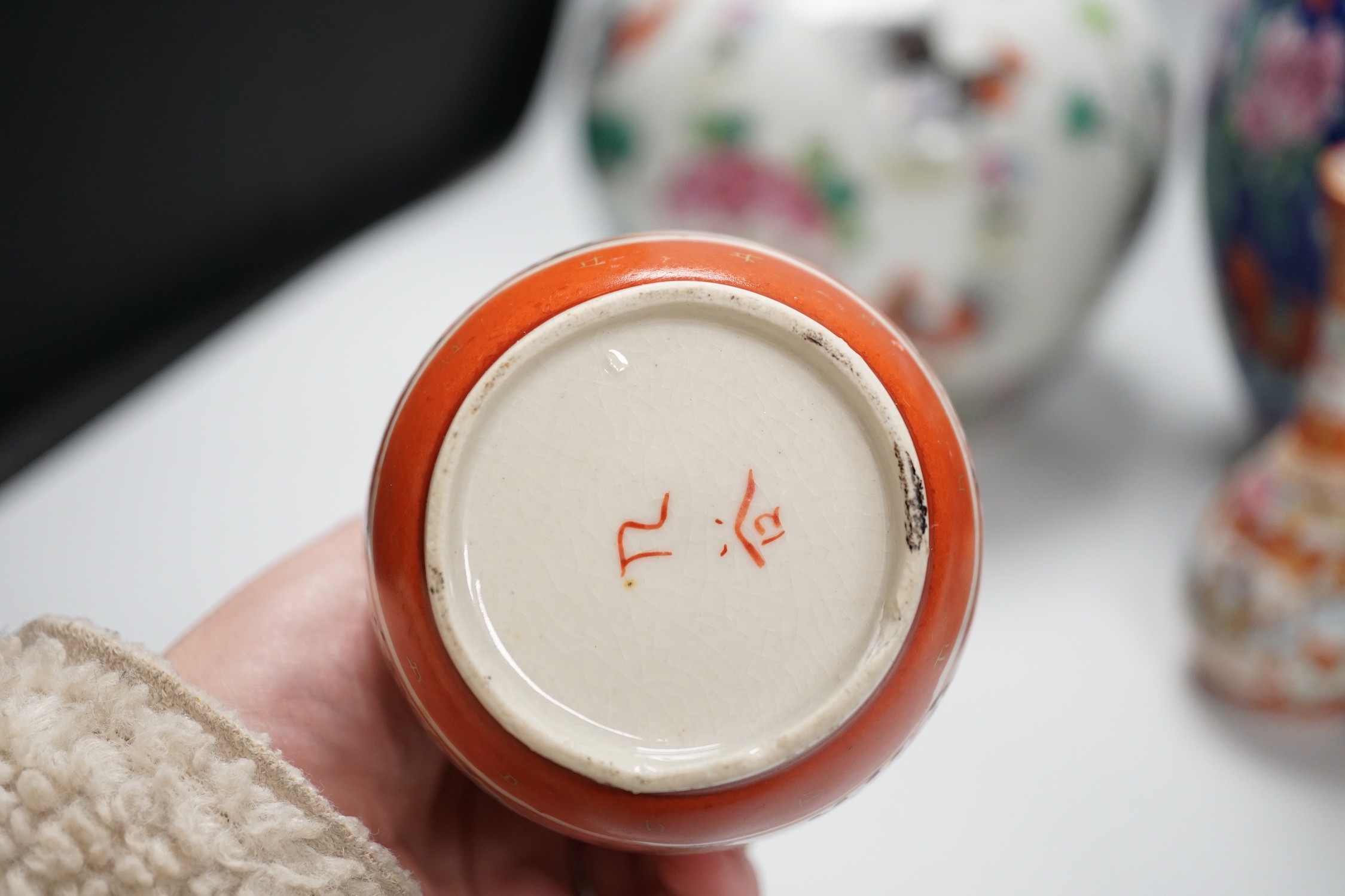 6 Japanese Kutani porcelain bottle vases together with two Chinese famille rose jars and covers, - Image 6 of 7