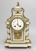 A late 19th century French ormolu and alabaster mantel clock with pendulum, 34cm