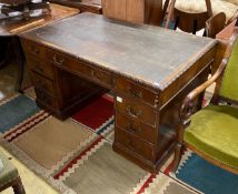 An early 20th century Chippendale revival mahogany pedestal desk, requiring restoration, length