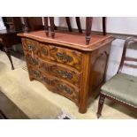 An 18th century style French walnut four drawer commode, width 126cm, depth 60cm, height 83cm