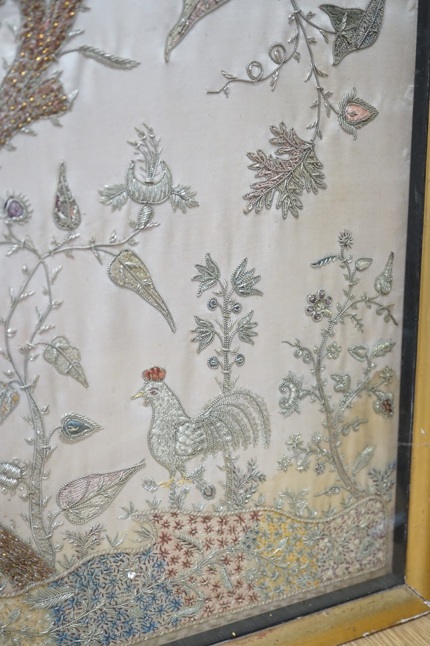 A framed silk, multi coloured metal thread embroidered Indian panel: a peacock seated amongst birds, - Image 6 of 8