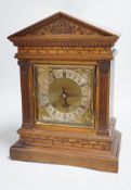 A late 19th century Black Forest oak bracket clock, 40.5cm