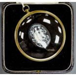 A French biscuit porcelain cameo, in convex frame, frame 7cm