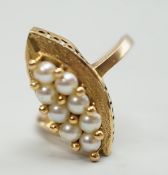 A modern continental yellow metal and seed pearl cluster set marquise shaped ring, size N, gross