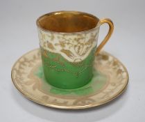 A Japanese export gilt and green coffee set,