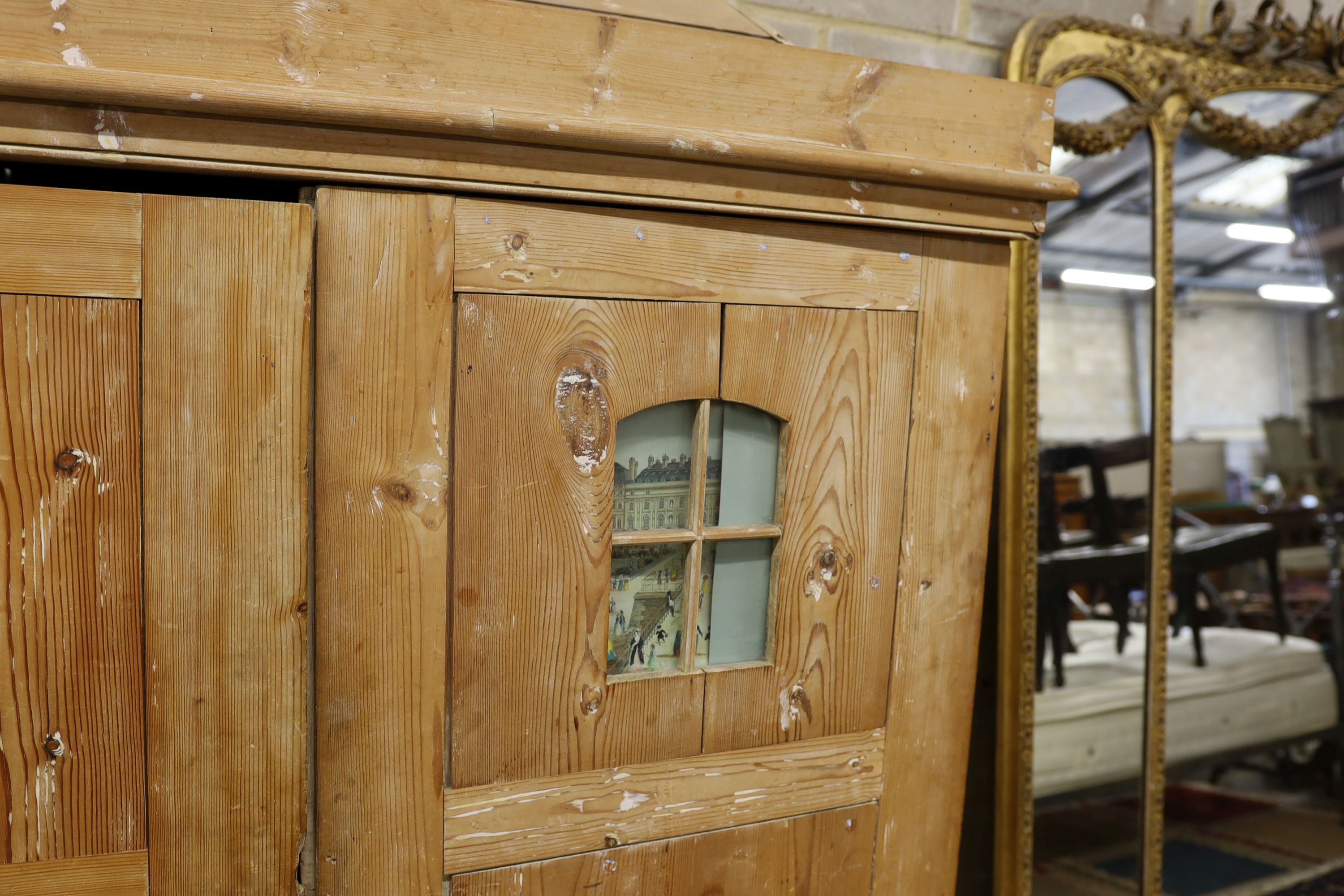 A 19th century stripped pine hall cupboard modelled as a dolls house the two door nine window facade - Image 8 of 20